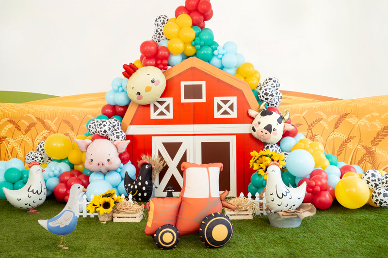 Pig foil balloon product image with colorful farm-themed decorations.